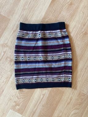 2 fitted stretch mini skirts